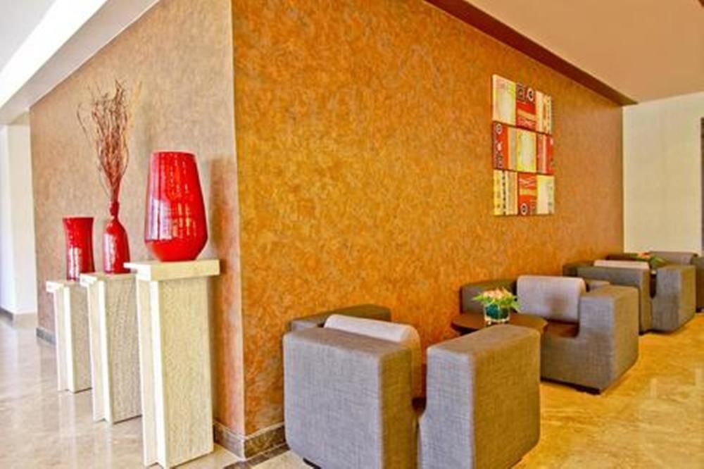 Regenta RPJ Rajkot Hotel Bagian luar foto