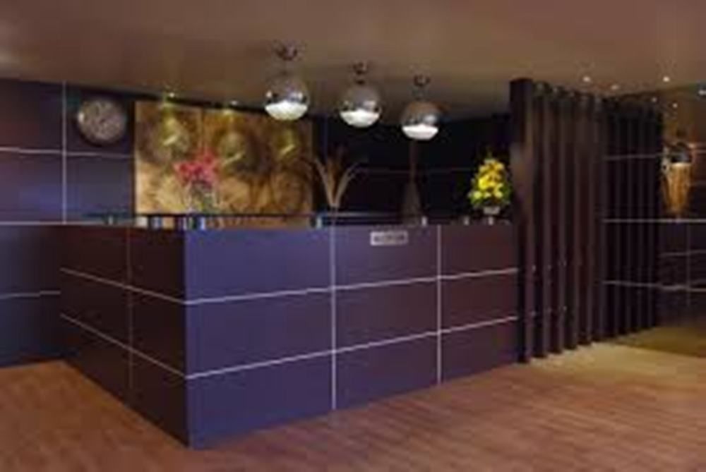 Regenta RPJ Rajkot Hotel Bagian luar foto