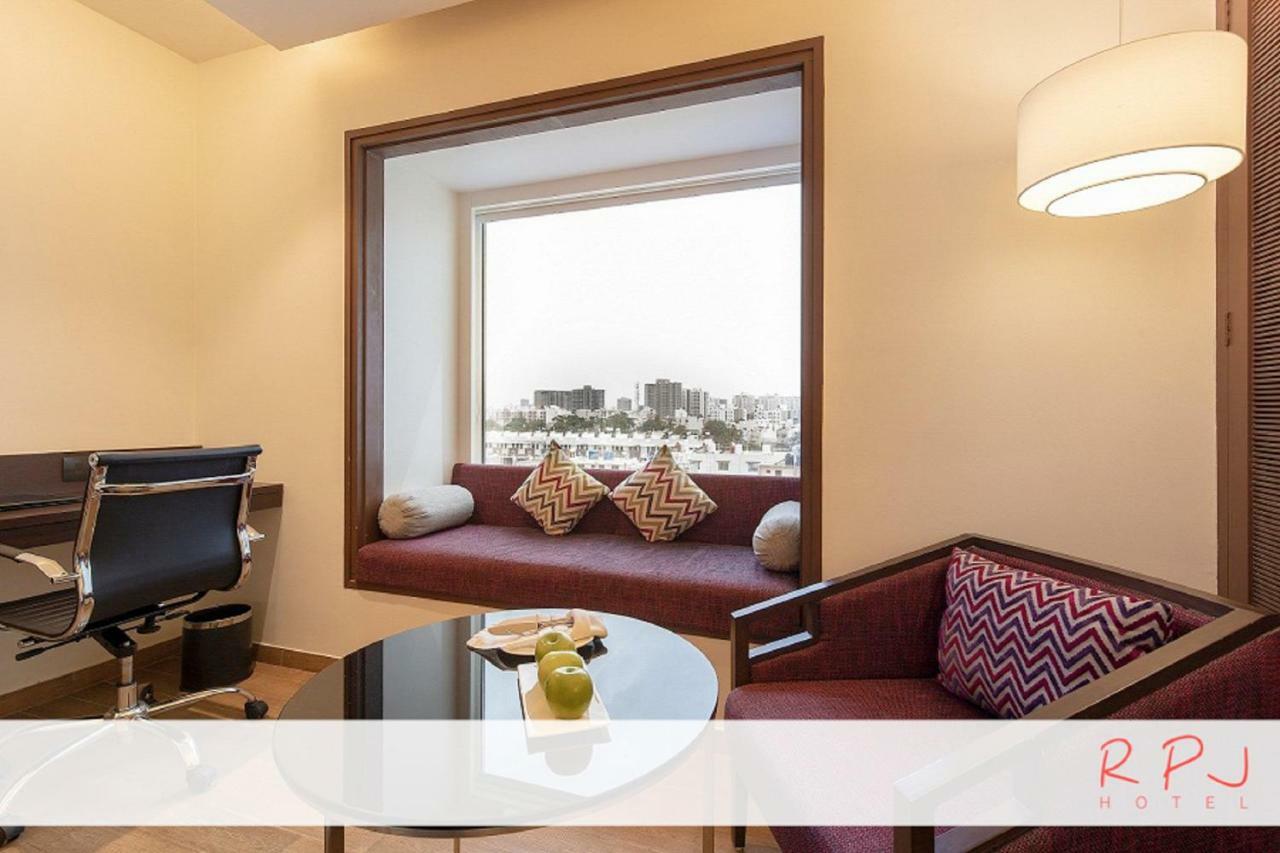 Regenta RPJ Rajkot Hotel Bagian luar foto